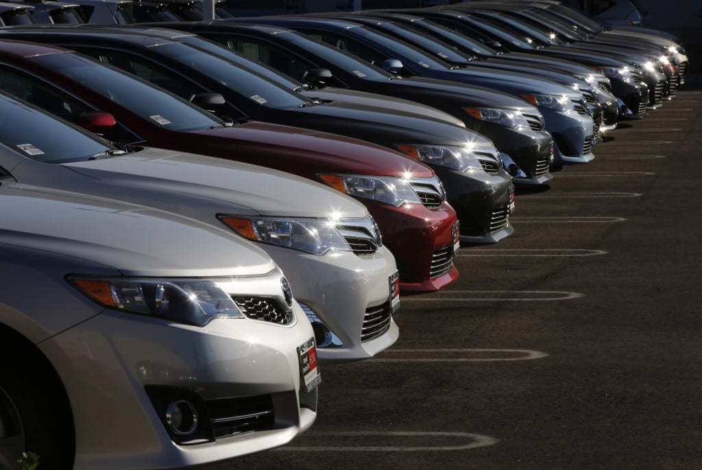 Toyota Motor Corp. Camry and Avalon vehicles are displayed for sale at the DCH Auto Group Dealership in Torrance, California, U.S., on Tuesday, July 30, 2013. Domestic and total vehicle sales figures are expected to be released on Aug. 1. Photographer: Patrick T. Fallon/Bloomberg