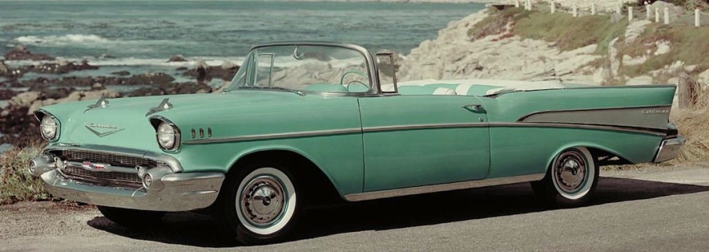 1957-Chevy-Bel_Air-Convertible-green in front of beach