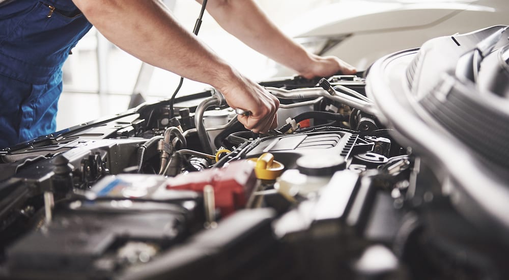 mechanic working on engine