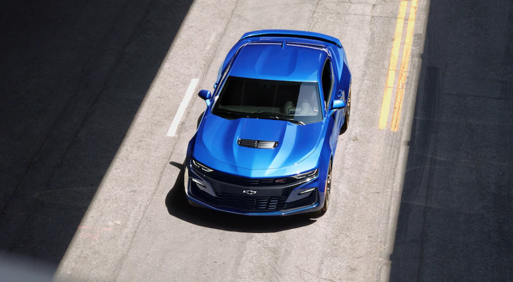 A blue 2019 Chevrolet Camaro 2SS is shown from above on a highway.