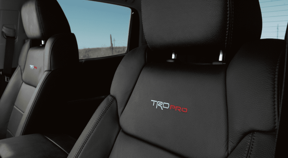 The black interior with red stitching of the 2019 Toyota Tundra TRD Pro is shown.