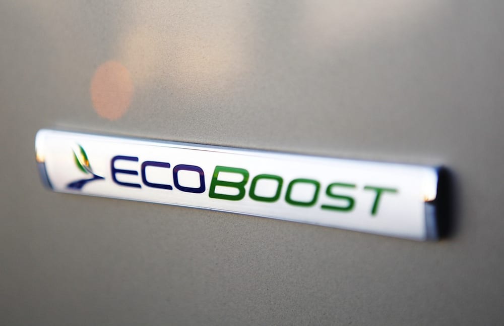 A closeup of the EcoBoost badging on a gray Ford