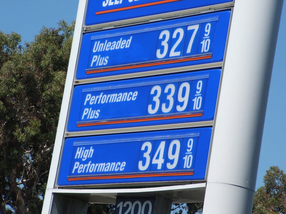 A blue gas prices sign is shown.