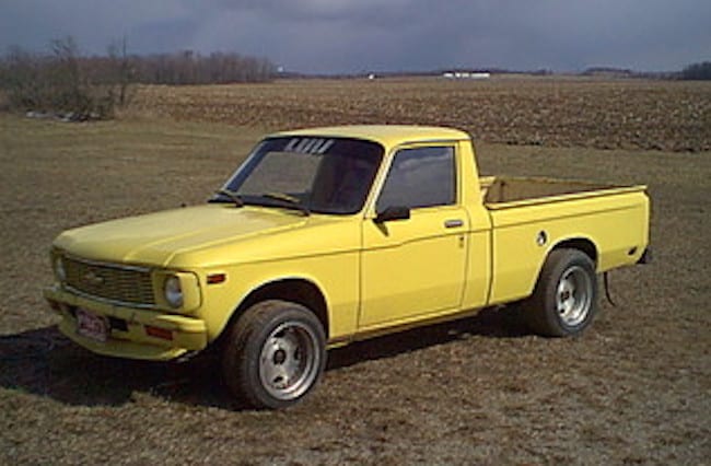 Yellow Chevy LUV in a field
