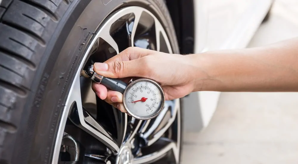 A tire with a gauge for checking pressure