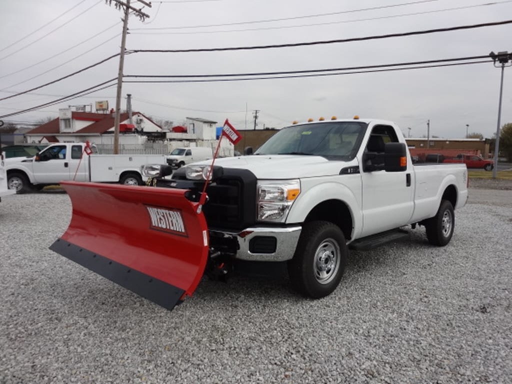 A white used truck for plowing