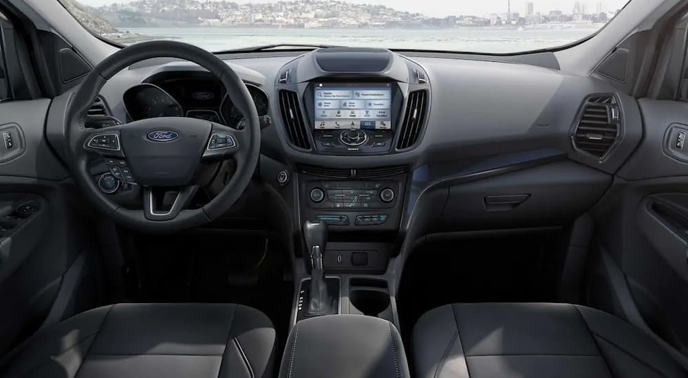 The black interior of a 2019 Ford Escape is shown.