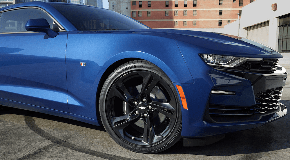 Closeup of blue 2019 Chevy Camaro ZL1 front passenger wheel well