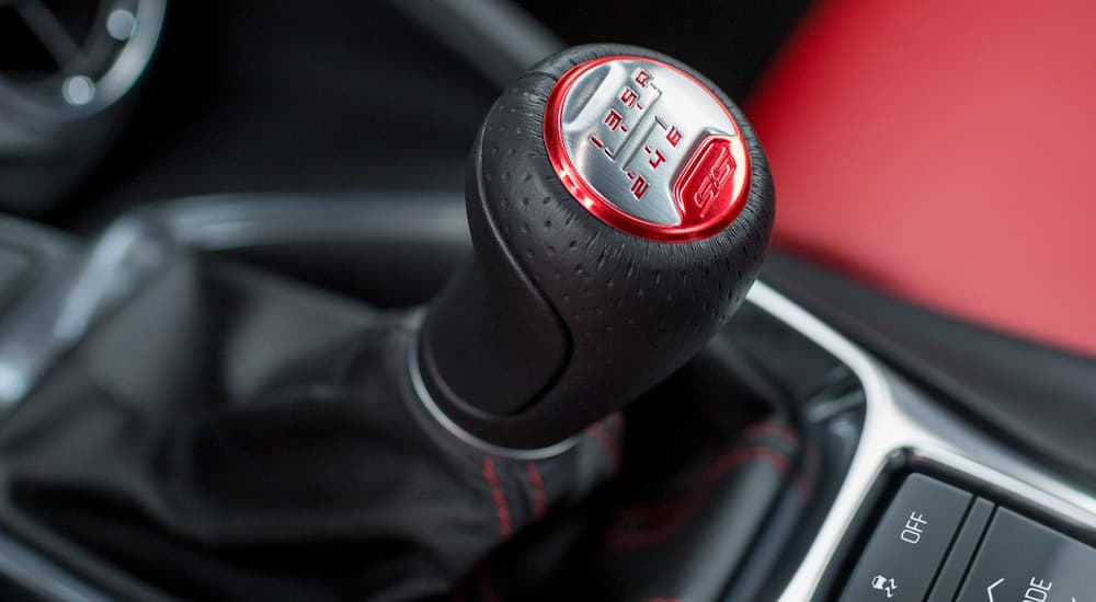 Closeup of black and red 2019 Chevy Camaro SS shifting knob