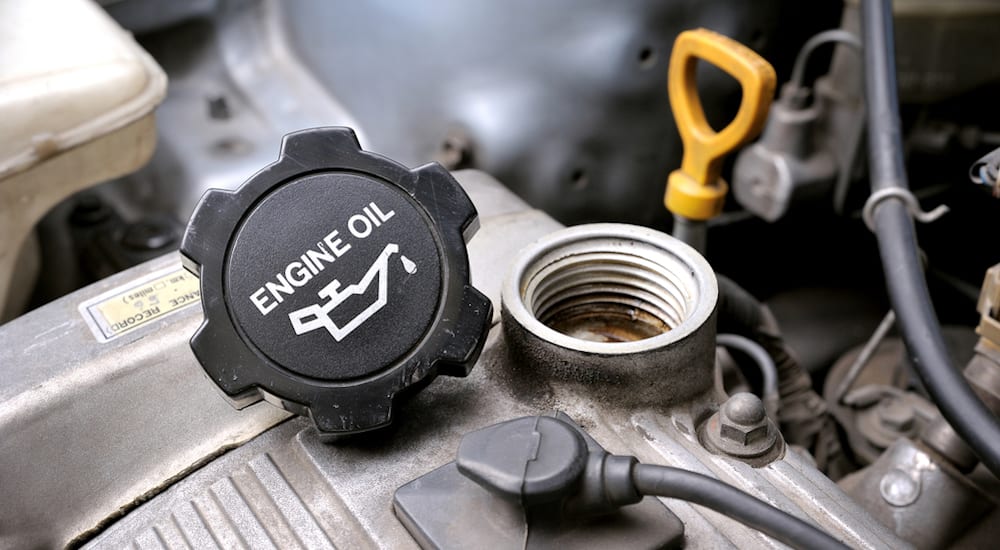 An engine oil fill cap and dipstick
