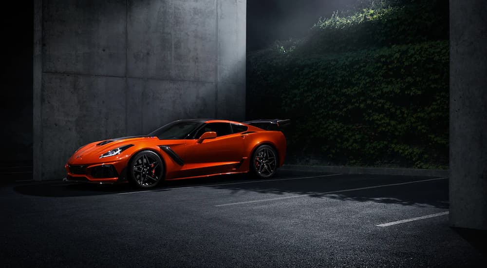 An orange 2019 Chevrolet Corvette ZR1 in a parking garage at night