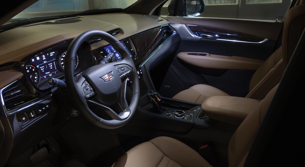 The brown and black interior of the 2020 Cadillac XT6 is shown.