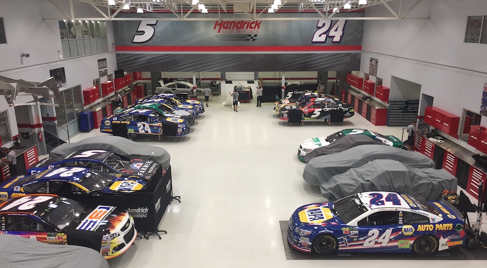 The garage of the powerhouse Hendrick Motorsports team full of race cars