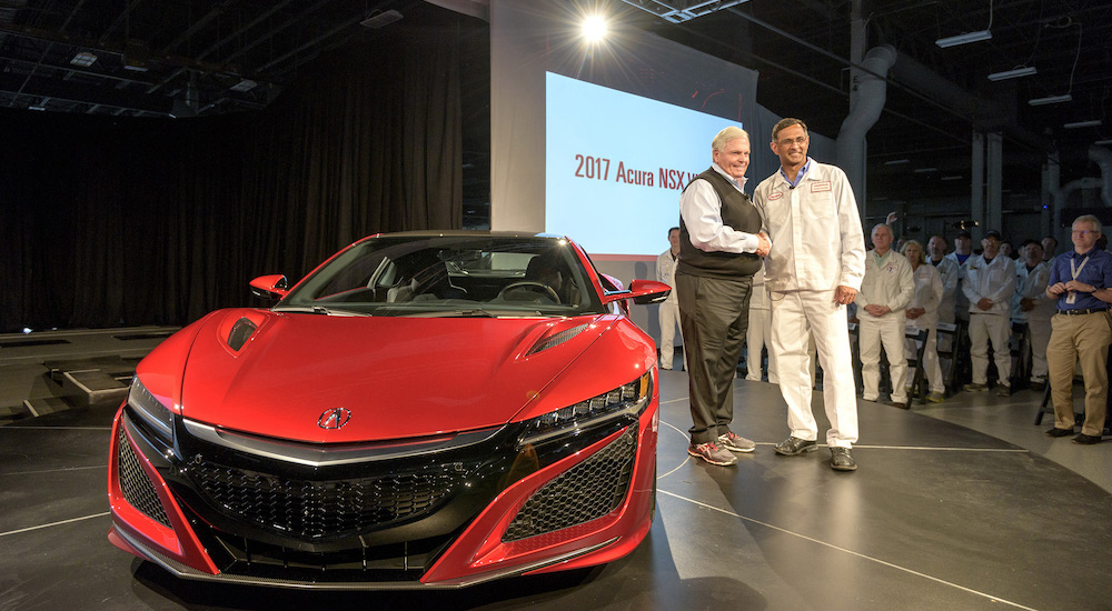 Rick Hendrick takes delivery of the first Acura NSX, red