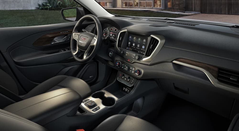 The black interior of the 2019 GMC Terrain is shown. It offers more features when comparing the 2019 GMC Terrain vs 2019 Honda CR-V.