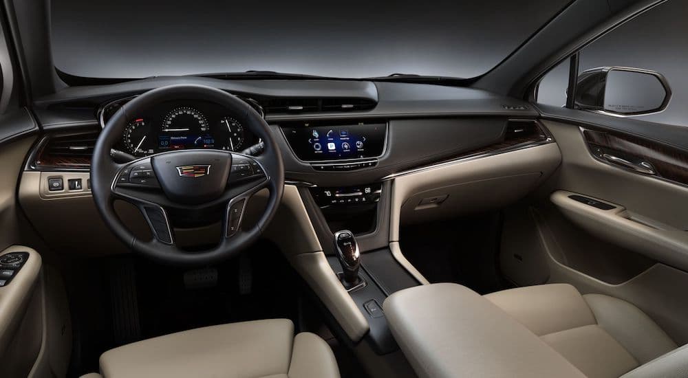 An inside look at the interior of the brand new Cadillac XT5 is shown.