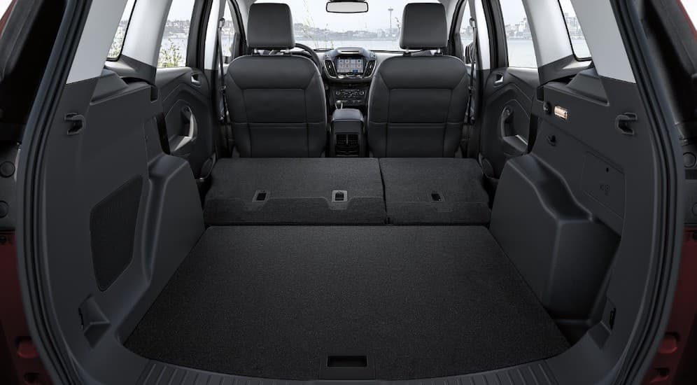 The black interior of the 2019 Ford Escape is shown from the trunk.