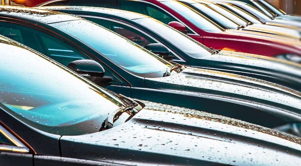 A line of sedans is shown at one of the used car lots in Milwaukee, WI. 