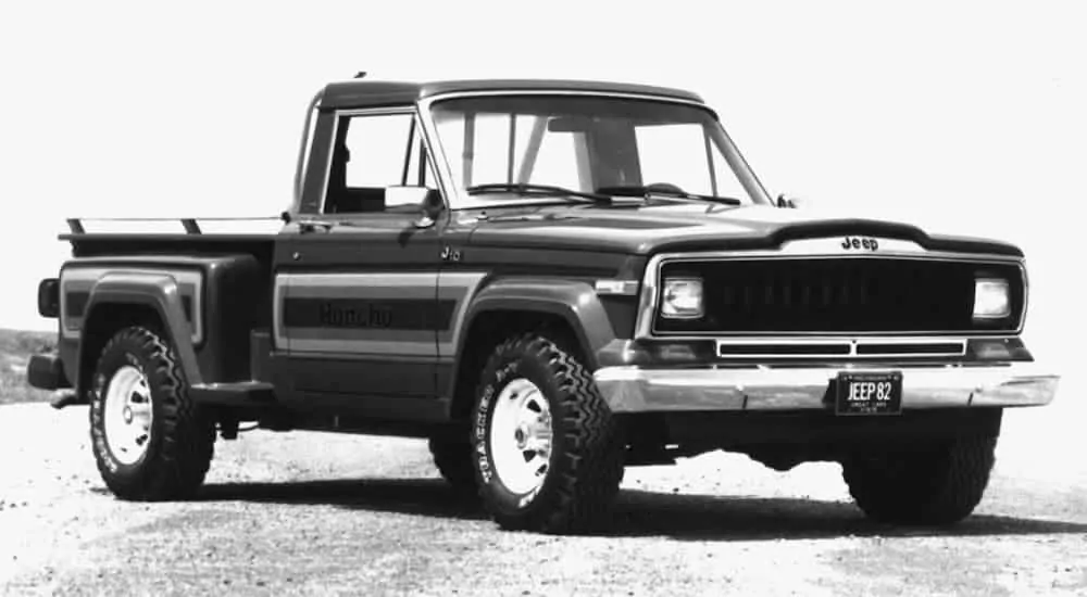 A black and white picture of a 1980s J-10 pickup truck.