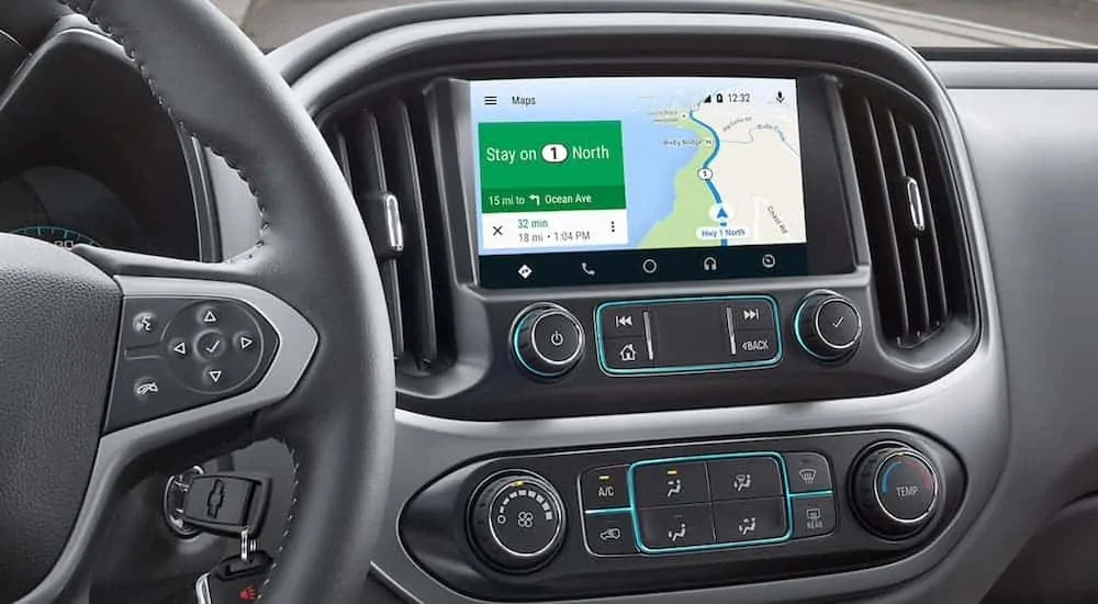 A close up of the infotainment system screen with navigation being used is shown.