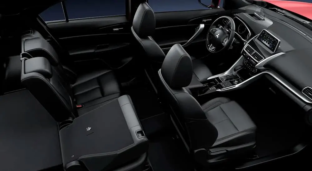 The black interior of a 2020 Mitsubishi Eclipse Cross is shown.