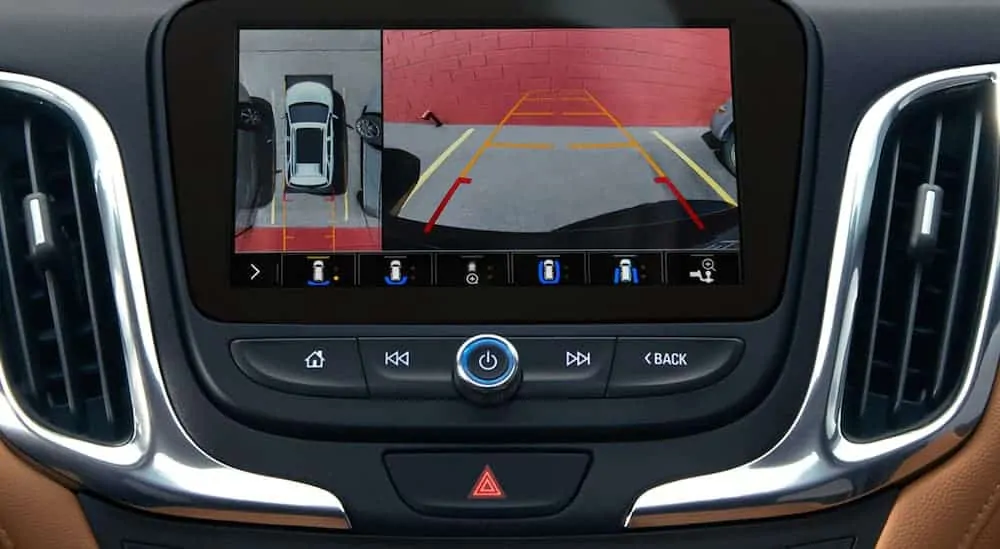 A close up of the infotainment screen on the 2020 Chevy Equinox is shown while using the backup camera.