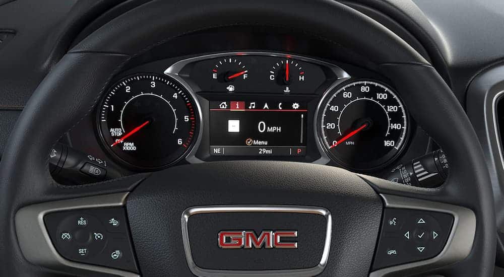A driver's view of the driver's display is shown inside of a 2020 GMC Terrain.