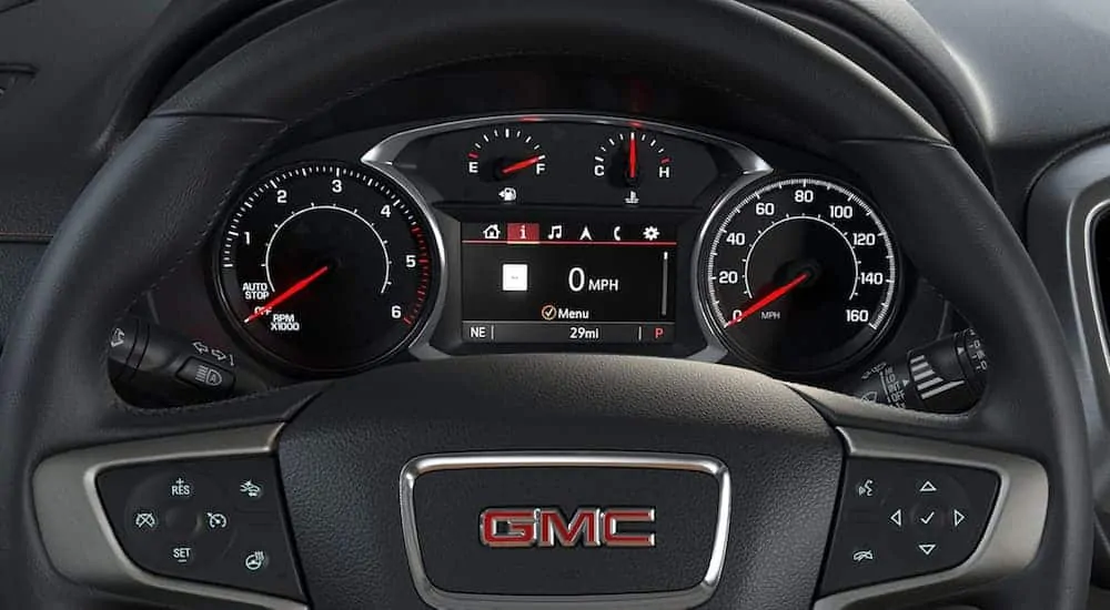A driver's view of the driver's display is shown inside of a 2020 GMC Terrain.