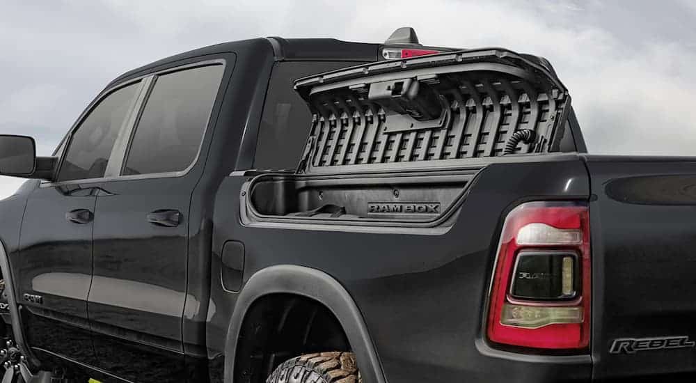The bed storage on a black 2020 Ram 1500 is shown.