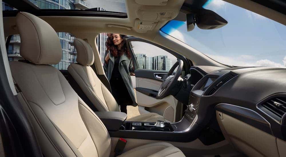 The tan interior is shown in a 2020 Ford Edge, winner of the 2020 Ford Edge vs 2020 Jeep Cherokee comparison.