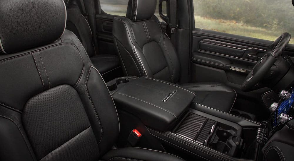 The black leather interior of a 2020 Ram 1500 Limited is shown.