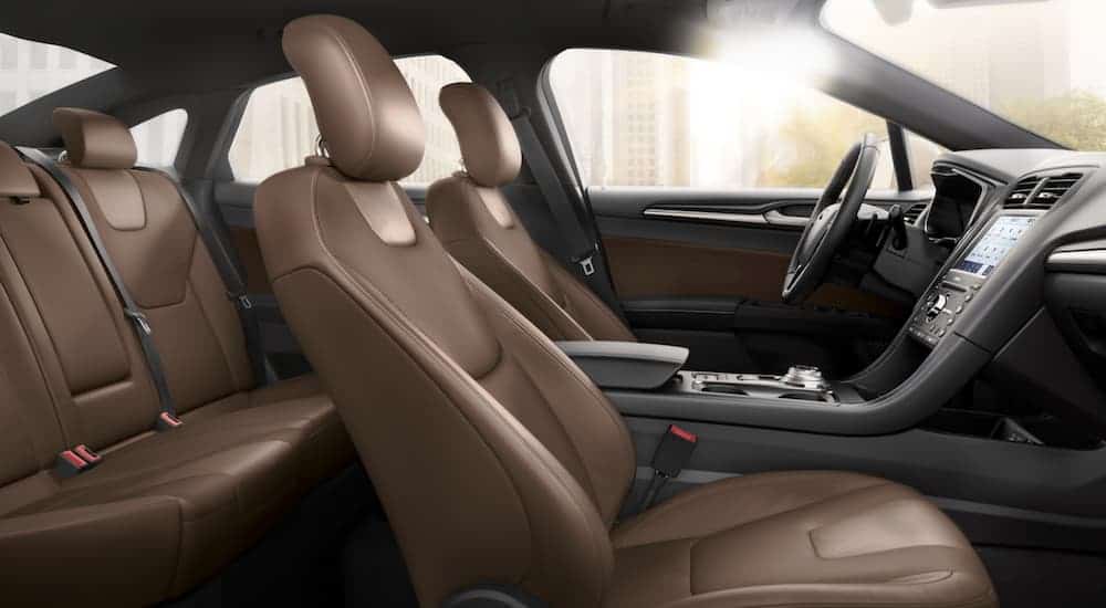 The brown interior of a 2019 Ford Fusion is shown.