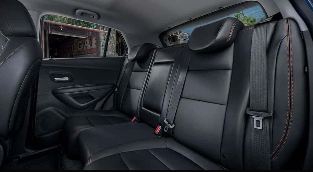 The black interior is shown in the 2020 Chevy Trax with a view of the rear seat.