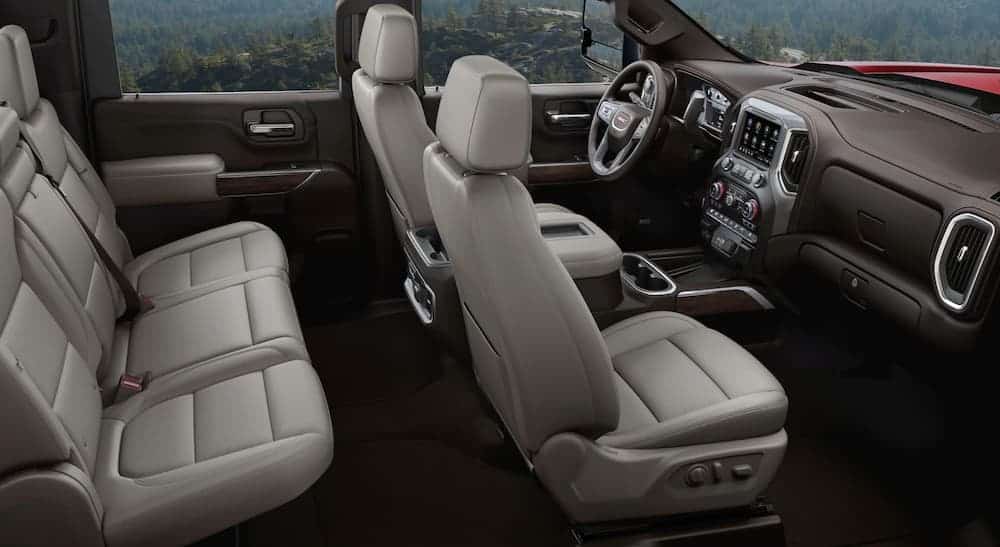 The white and brown interior of the 2020 GMC Sierra 2500 is shown.