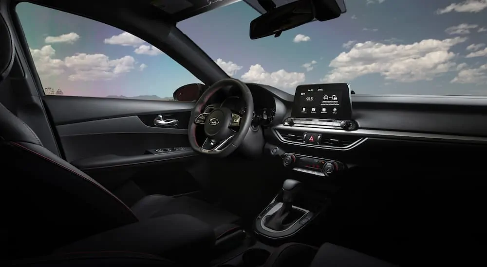 The black interior of a 2020 Kia Forte is shown.