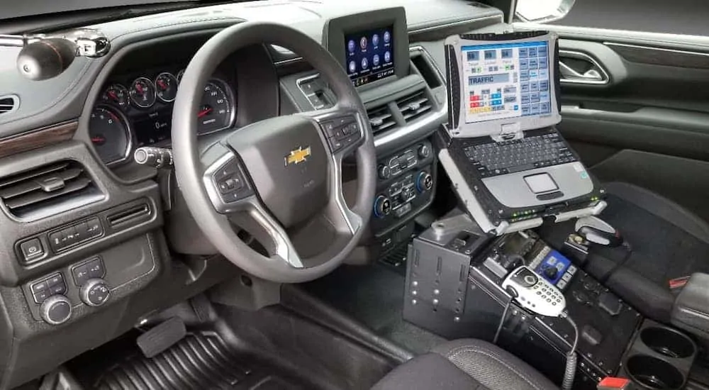 The look at the inside dashboard, center console and Police setup inside a 2021 Chevy Tahoe PPV.