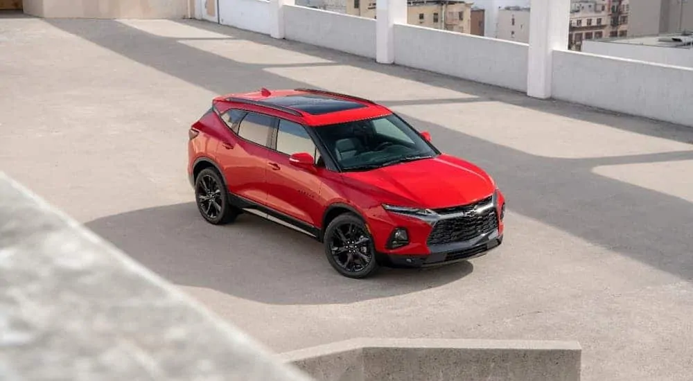 A red 2020 Chevy Blazer RS is parked in a parking garage and shown from a high angle after winning the 2020 Chevy Blazer vs 2020 Nissan Murano comparison.