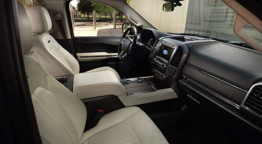 The tan interior of a 2020 Ford Expedition Platinum is shown, the winner of the 2020 Ford Expedition vs 2020 Ford Explorer comparison.