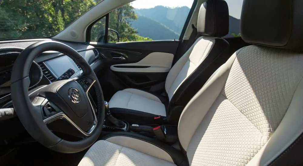 The white and black interior of a 2020 Buick Encore is shown.