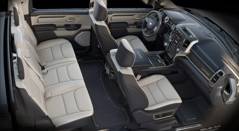 The cream and grey interior of a 2020 Ram 1500 Limited is shown.
