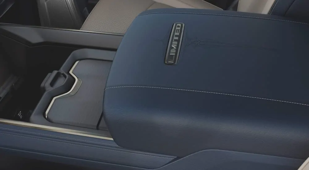The details on the center console inside the 2020 Ram 2500 Limited are shown.