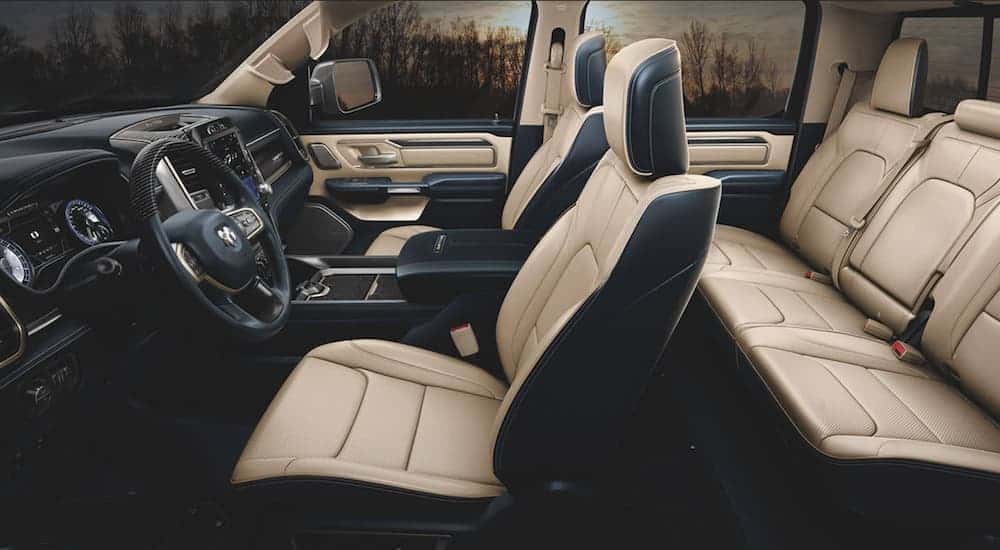The tan and black interior is shown on 2020 Ram 1500 Longhorn, showing the comfort and style of Ram trucks.