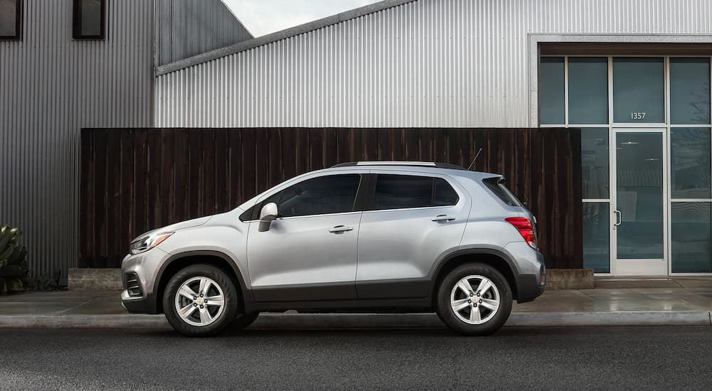A silver 2021 Chevy Trax is shown parked in a profile view.