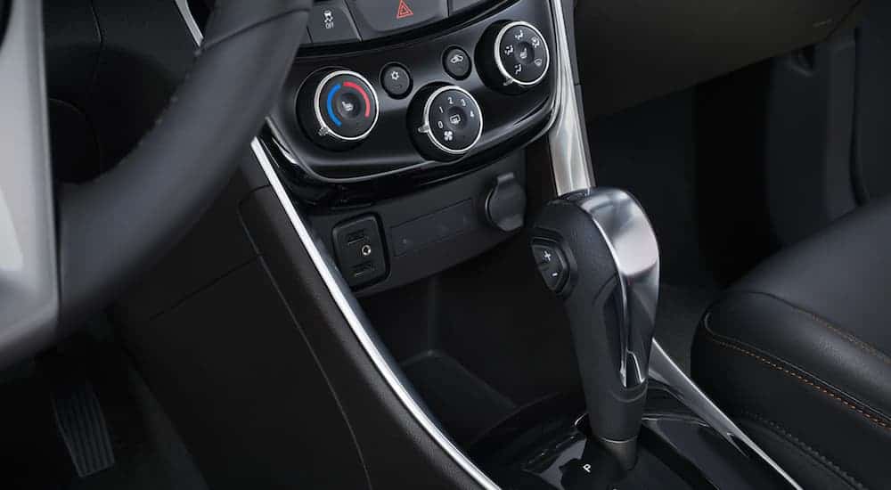 The shifter and climate controls are shown on the 2021 Chevy Trax.