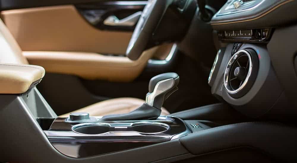 The tan and black interior is shown on a 2021 Chevy Blazer.