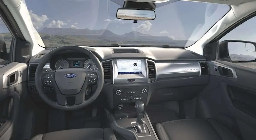 The black interior is shown on a 2021 Ford Ranger STX.
