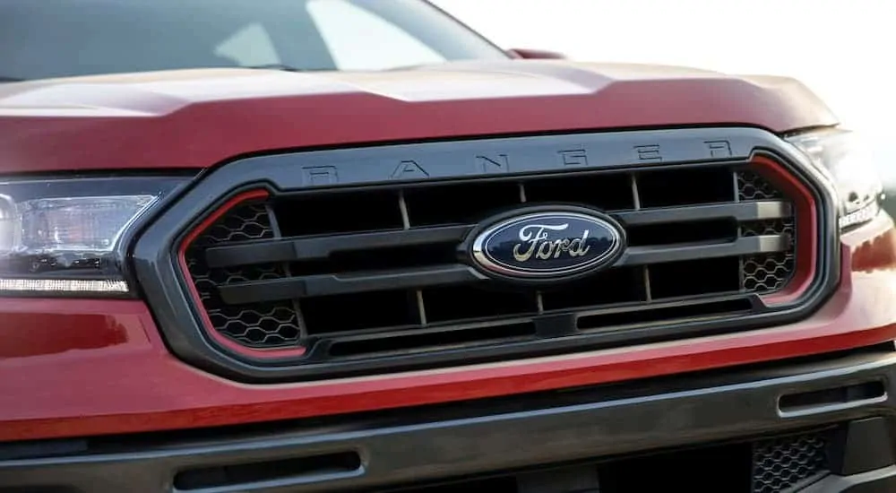 A close up of the badging and grille on a 2021 Ford Ranger Tremor Lariat is shown.