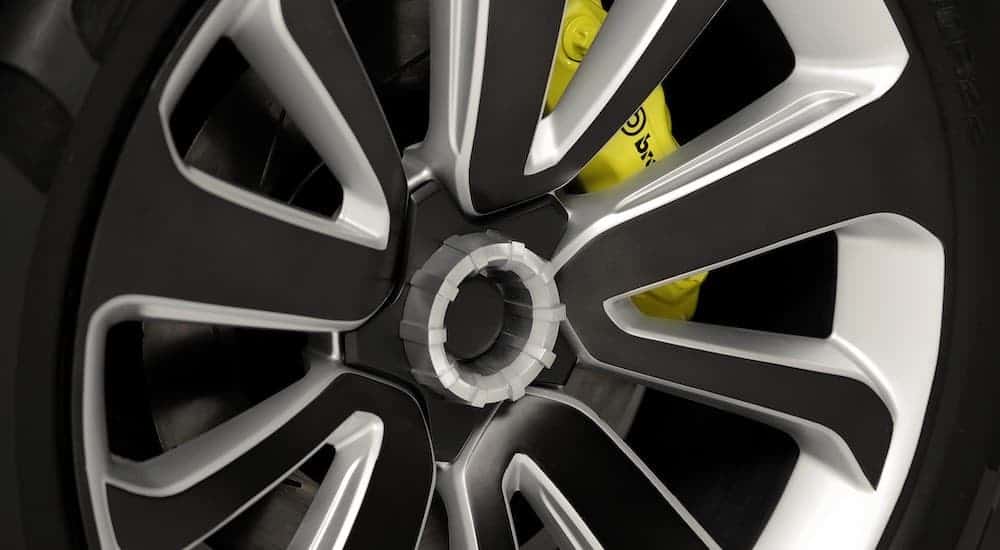 A close up is shown on the 2021 Hyundai Santa Cruz wheel and performance caliper.