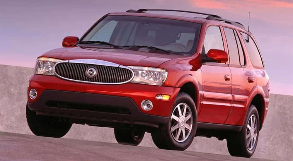 A red 2004 Buick Ranier is parked after leaving a Buick dealership near you.