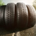 Tires lined up on a summer road